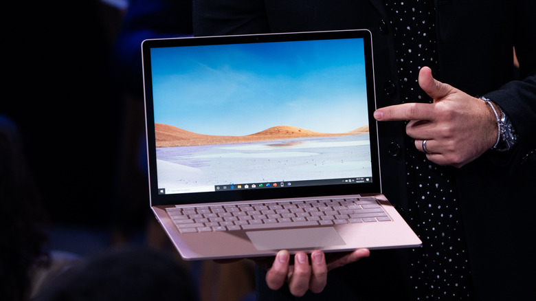 Person holding Surface Laptop 3