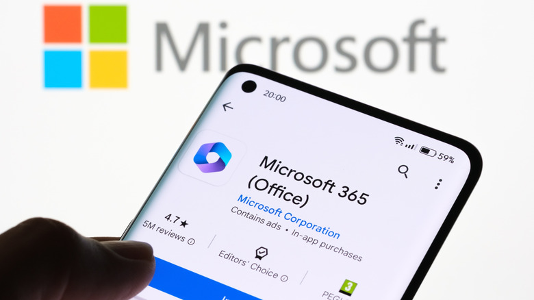 App Installation on Smartphone with Microsoft Logo in Background