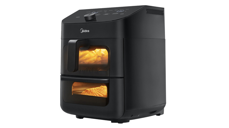 The Midea Two-Zone Air Fryer Oven in use