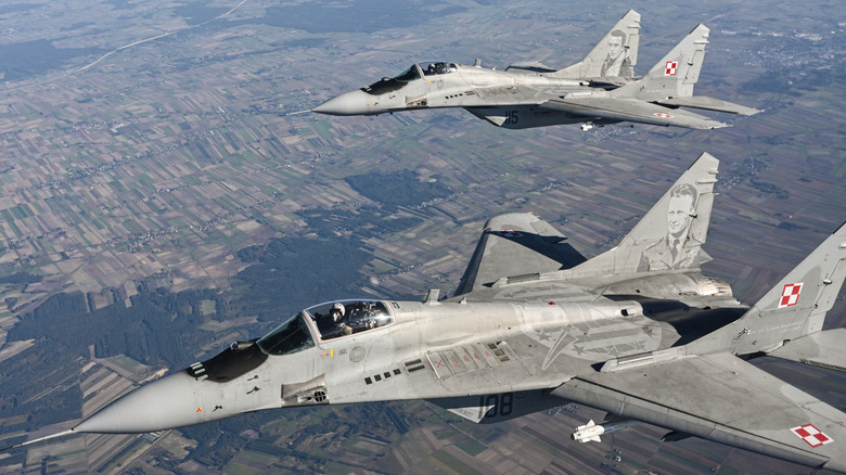 Two MiG-29s flying side-by-side