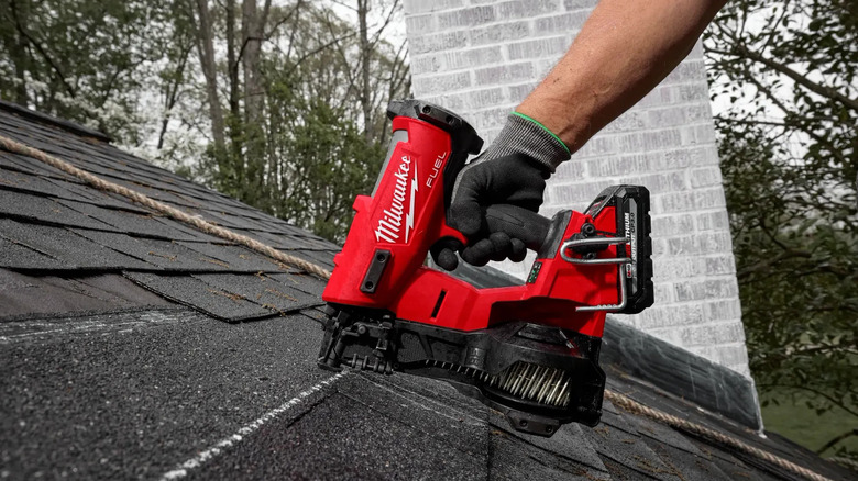 M18 Fuel Coil Roofing Nailer in use on roof