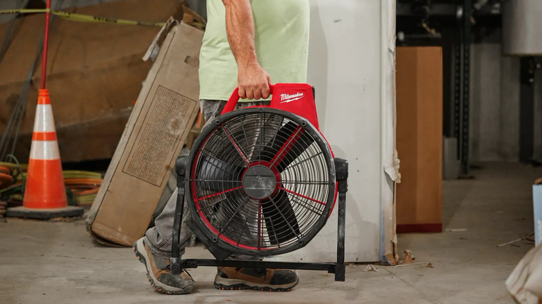 M18 Brushless 18-inch Fan being carried