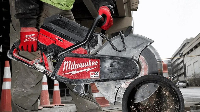 Milwaukee MX Fuel 14-inch Cut-Off Saw used on a conduit