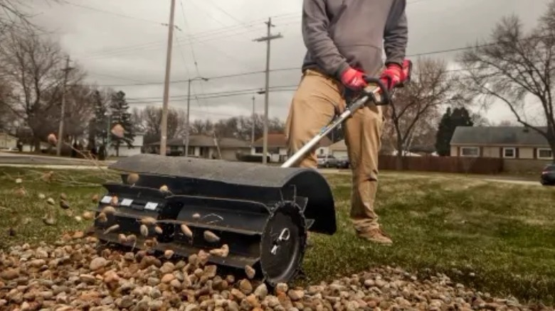 person using Power Broom