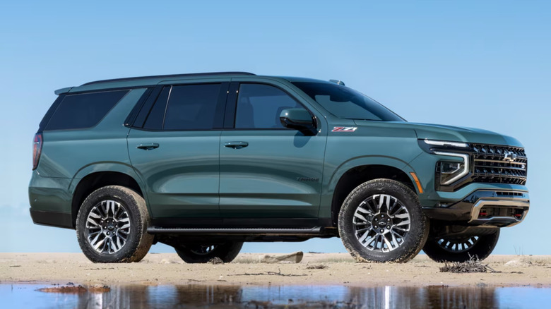 Chevy Tahoe parked on a sandy beach