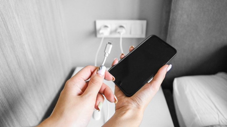 Charging phone by bedside