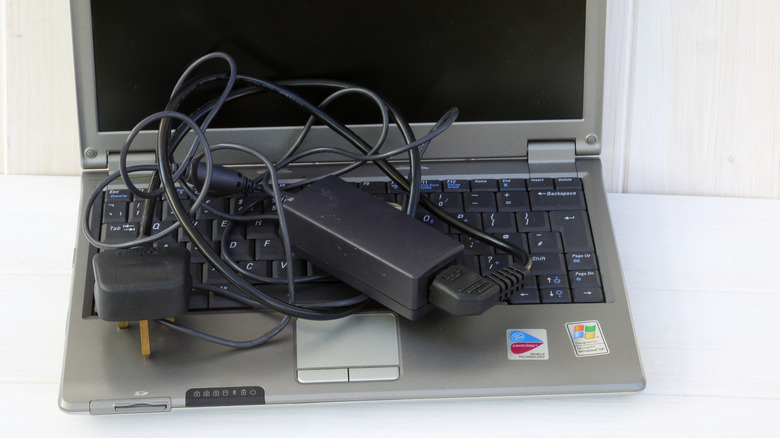 Old laptop with charger