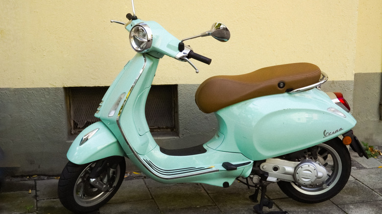 Vespa scooter on parked on the street