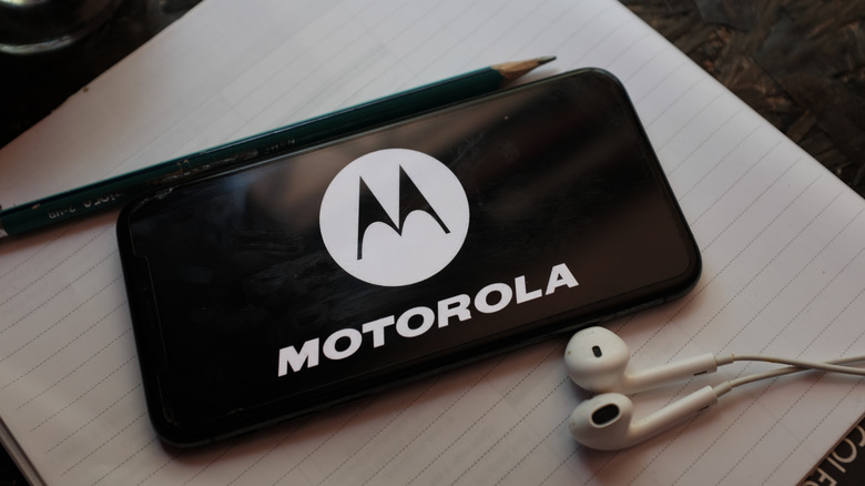 Motorola logo seen on a smartphone display.