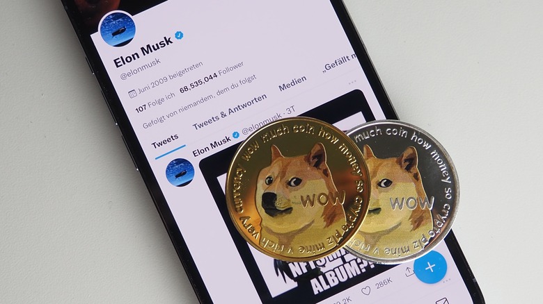 Twitter mobile app on a phone with Doge tokens on top.