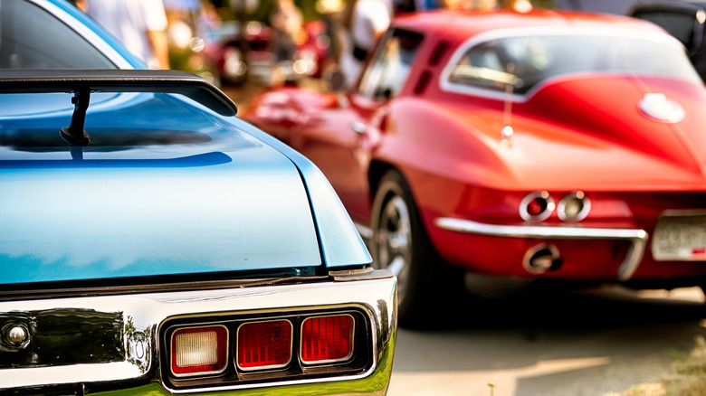 Classic cars parked at an auto show