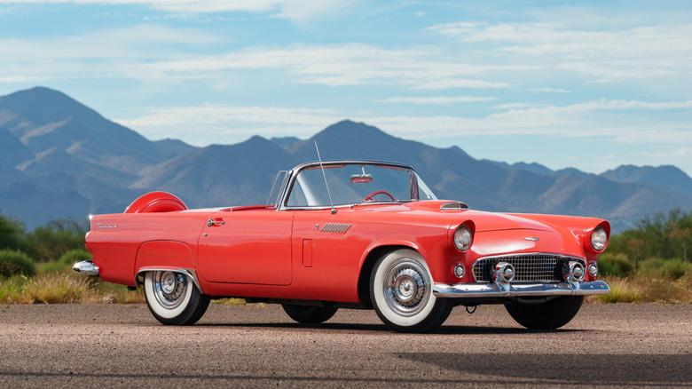 Red 1956 Ford Thunderbird convertible, front-right three-quarter view