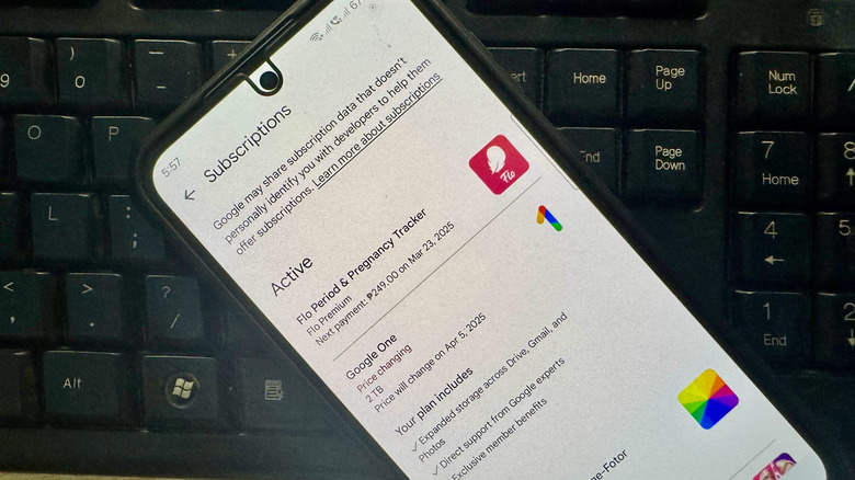 Android phone showing app subscriptions on Play Store while on top of keyboard