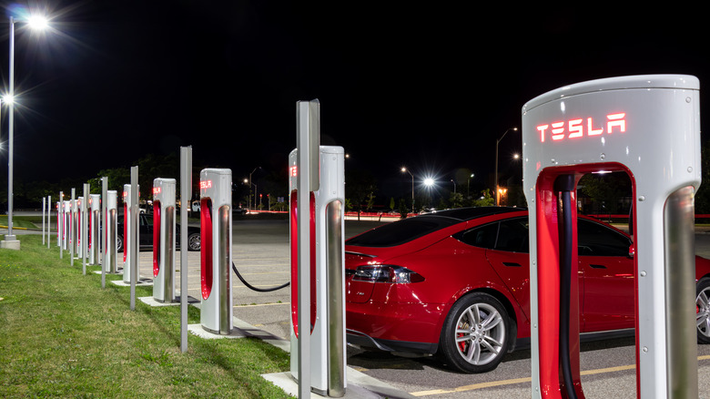 Tesla Supercharger station at night