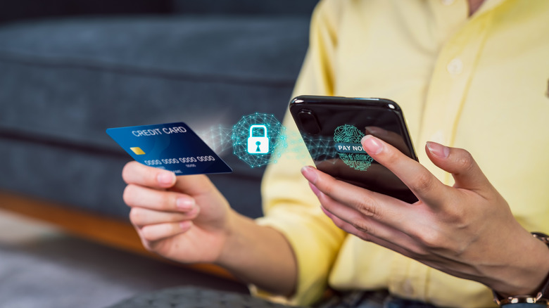 Woman paying online with a credit card