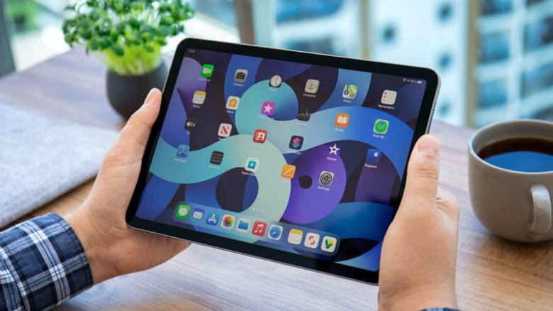 Man holding an iPad