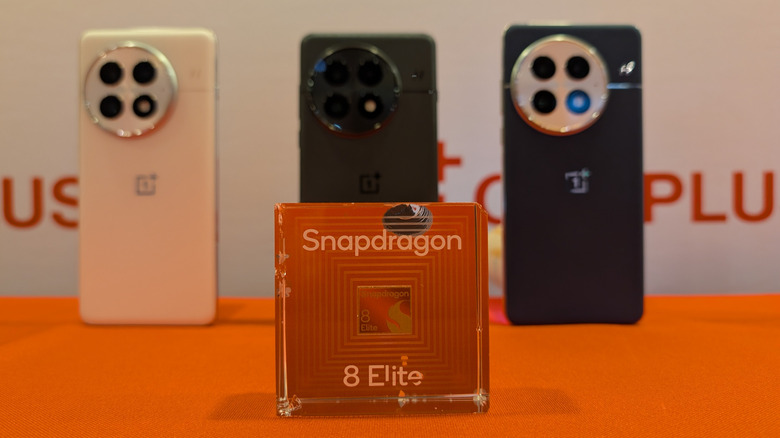 Snapdragon 8 Elite processor with three OnePlus 13 phones in the background.