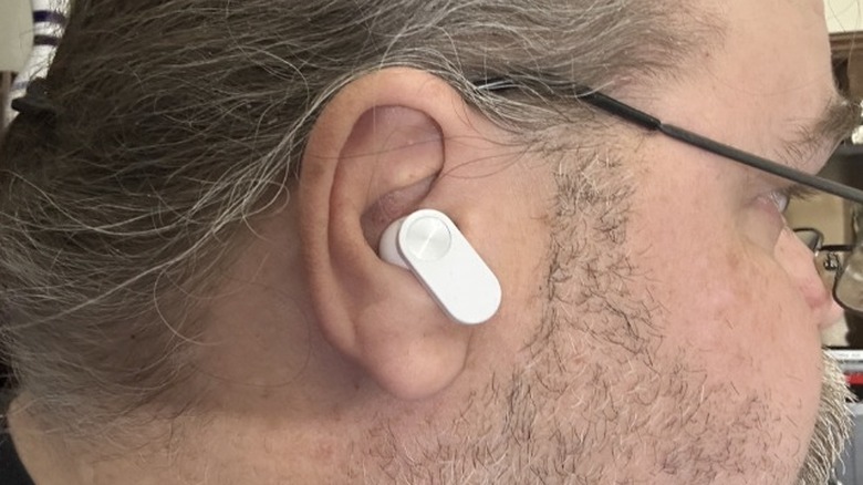 Man wearing an earbud