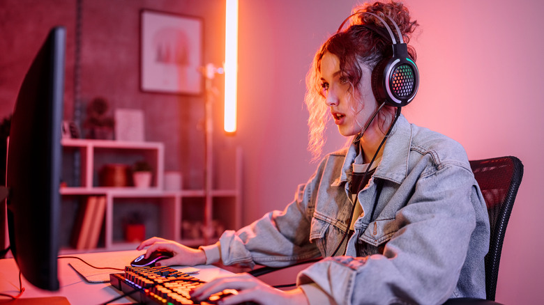 Woman playing games on PC