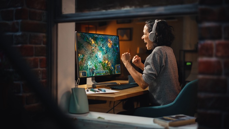 Woman playing games on PC