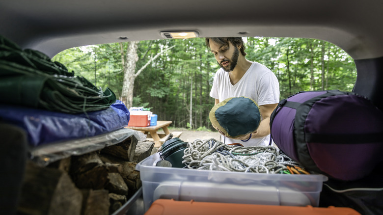 Packing car for camping supplies gear overlanding