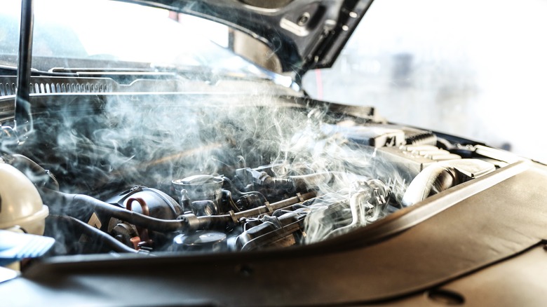 car engine producing smoke