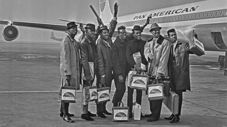 The Temptations before Pan Am plane