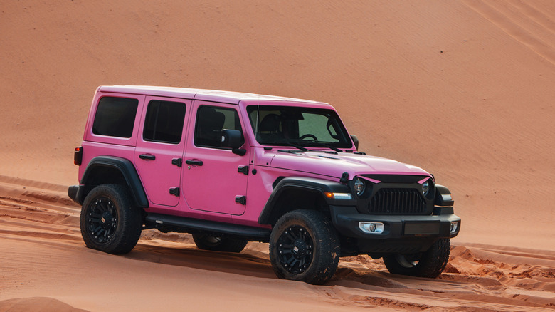 Pink Jeep Wrangler in desert