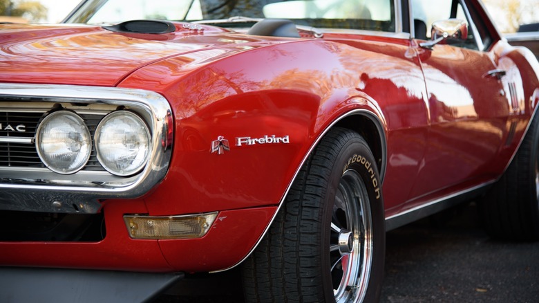 Red Pontiac Firebird front fender