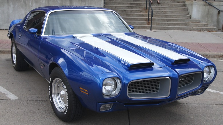 Blue 1970 Pontiac Firebird parked