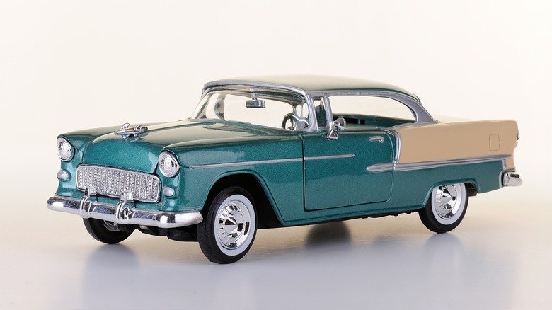 A 1950s Pontiac car on a white background