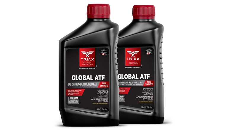 Two bottles of Triax Global ATF