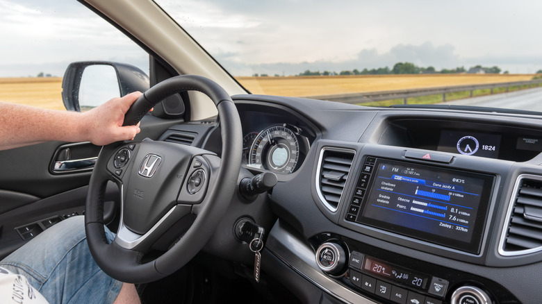 Man driving a 2015 Honda CR-V