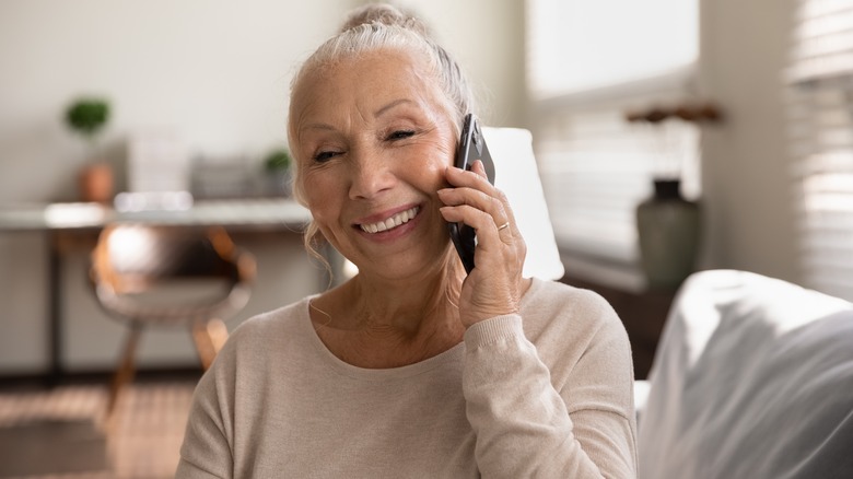 older woman talking on smartphone