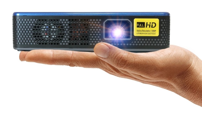 M7 projector in palm of hand