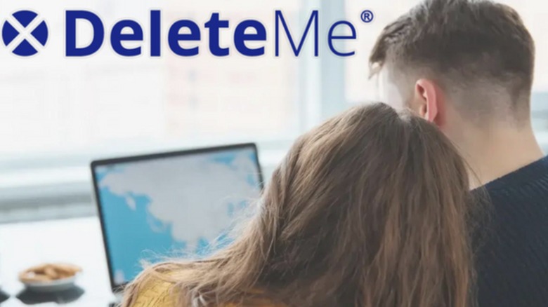 DeleteMe ad couple looking at a laptop