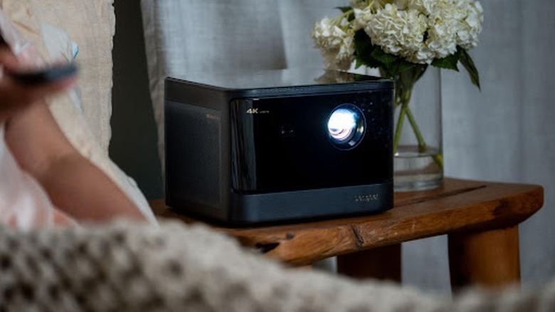 Dangbei projector on an end table