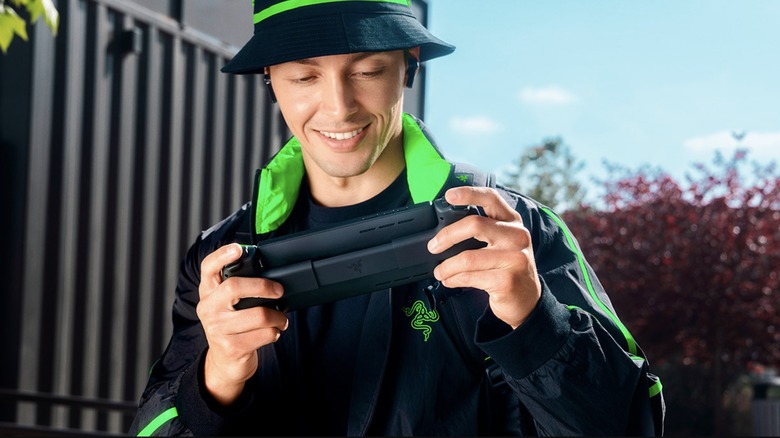 Person using the Razer Edge Handheld powered by the Qualcomm G3x chip.