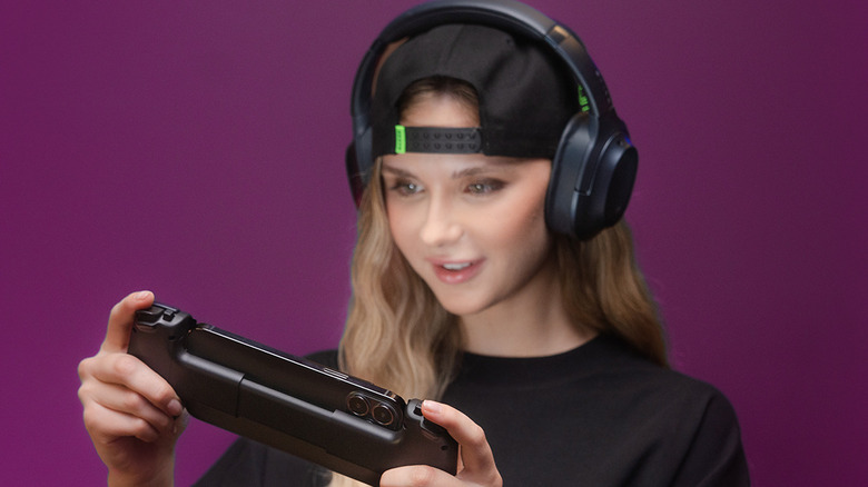 Woman plays using Razer Kishi