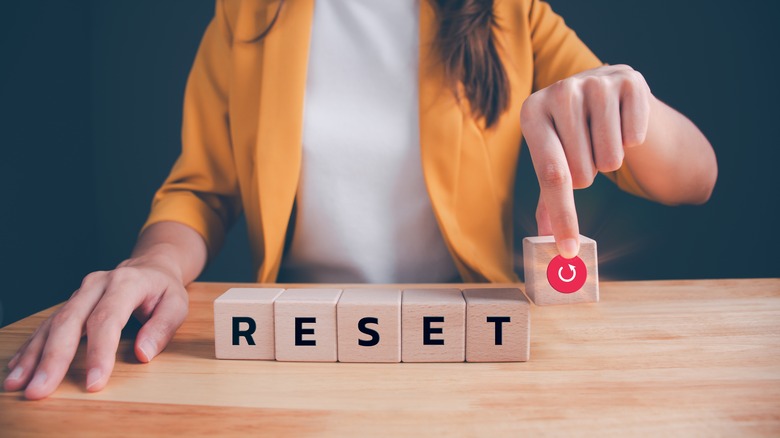 Wooden blocks spelling out the word RESET