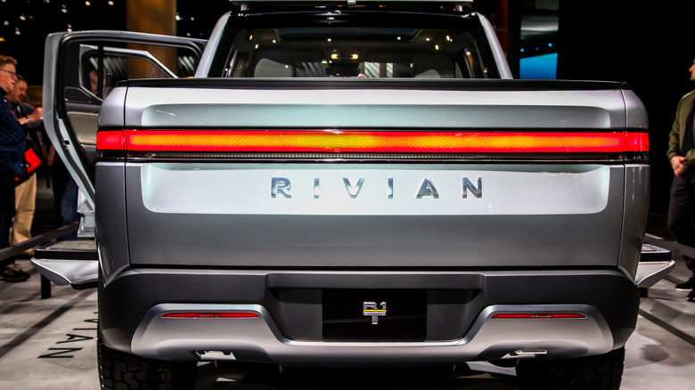 The rear profile of a Rivian electric truck.