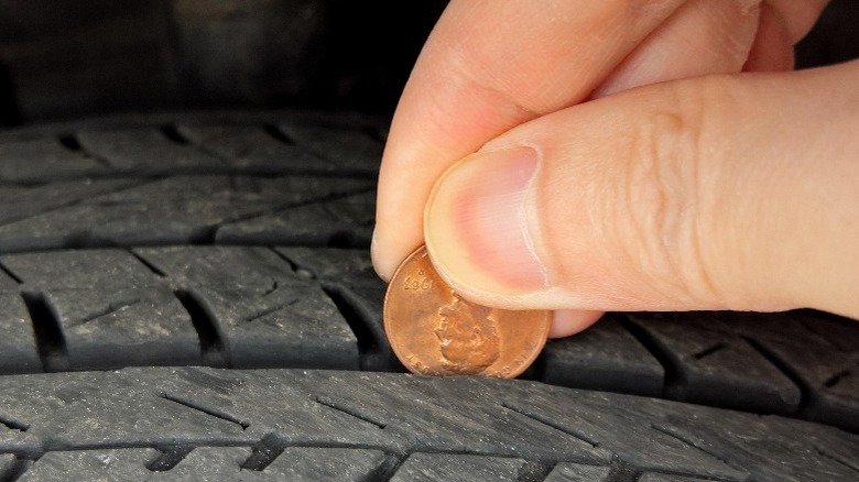 person doing penny test