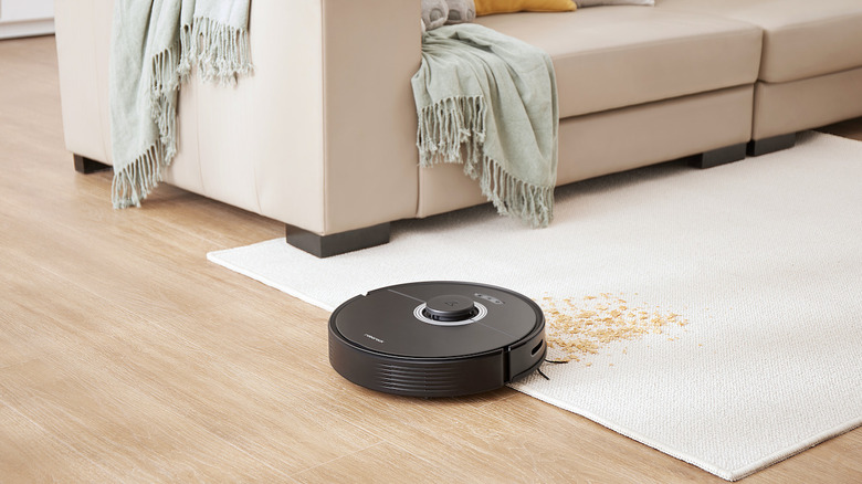 Roborock Q7Max vacuuming mess of crumbs on carpet