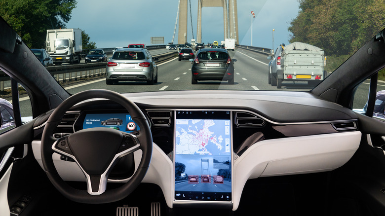 Self-driving car on highway bridge