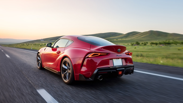 Red Supra riding off into the distance