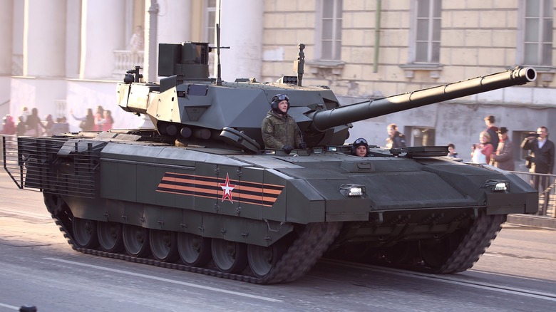 Main battle tank T-14 object 148 on heavy unified tracked platform Armata driving in a parade