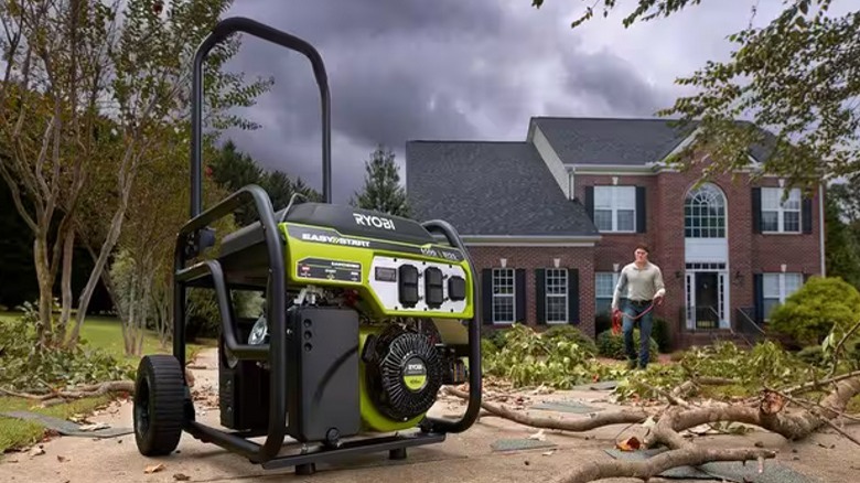 Man approaching Ryobi generator