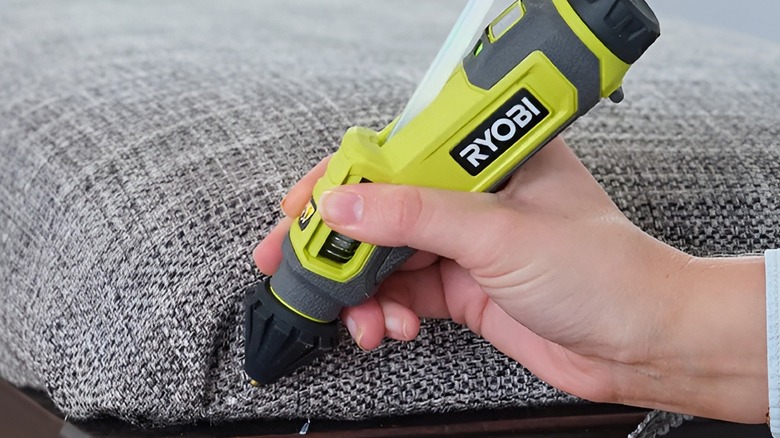 Using Ryobi glue pen on couch fabric