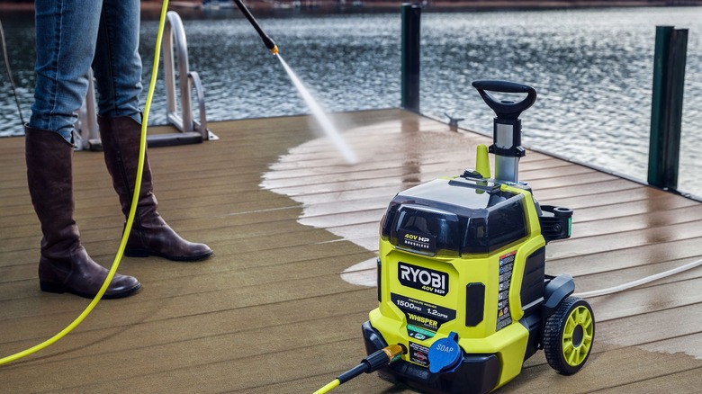 Ryobi pressure washer spraying deck