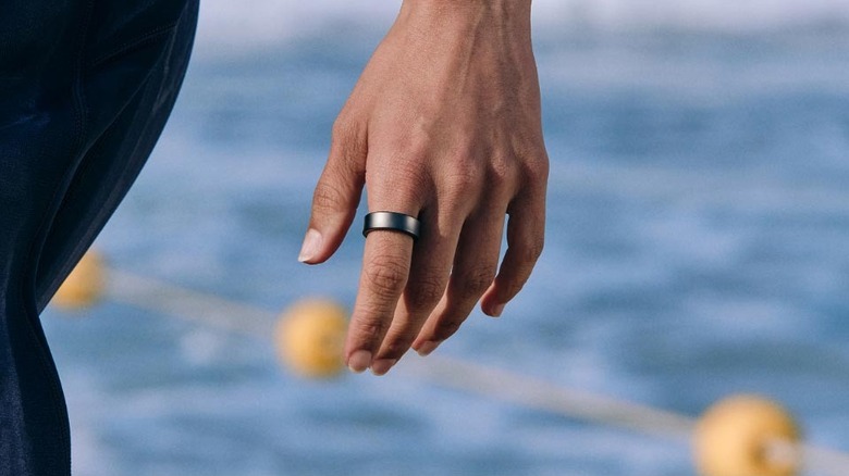 man wearing Galaxy Ring at pool